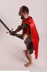 Man Adult Average White Fighting with sword Standing poses Casual